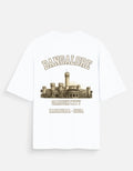A white short-sleeve t-shirt with a vintage-style graphic on the front featuring the text 'BANGALORE' and 'GARDEN CITY' with an illustration of a historic building, set against a light gray background.