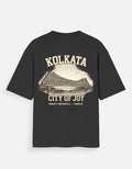A black short-sleeve t-shirt with a vintage-style cream graphic on the front depicting the Kolkata bridge and the text 'KOLKATA CITY OF JOY WEST BENGAL - INDIA'.