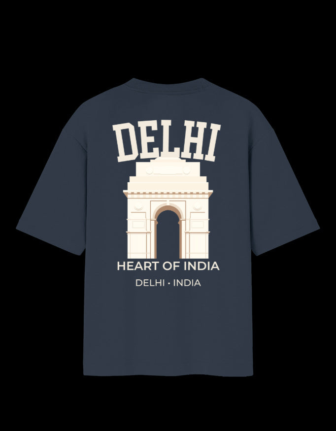 A navy blue short-sleeve t-shirt with a graphic print of the India Gate monument in Delhi, featuring the text 'DELHI' and 'HEART OF INDIA' on a navy backgound.