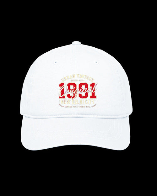A white baseball cap with a curved brim, featuring a red and beige graphic on the front that reads 'Original 1931' with 'New Orleans' and 'French Quarter' details, set against a solid black background.