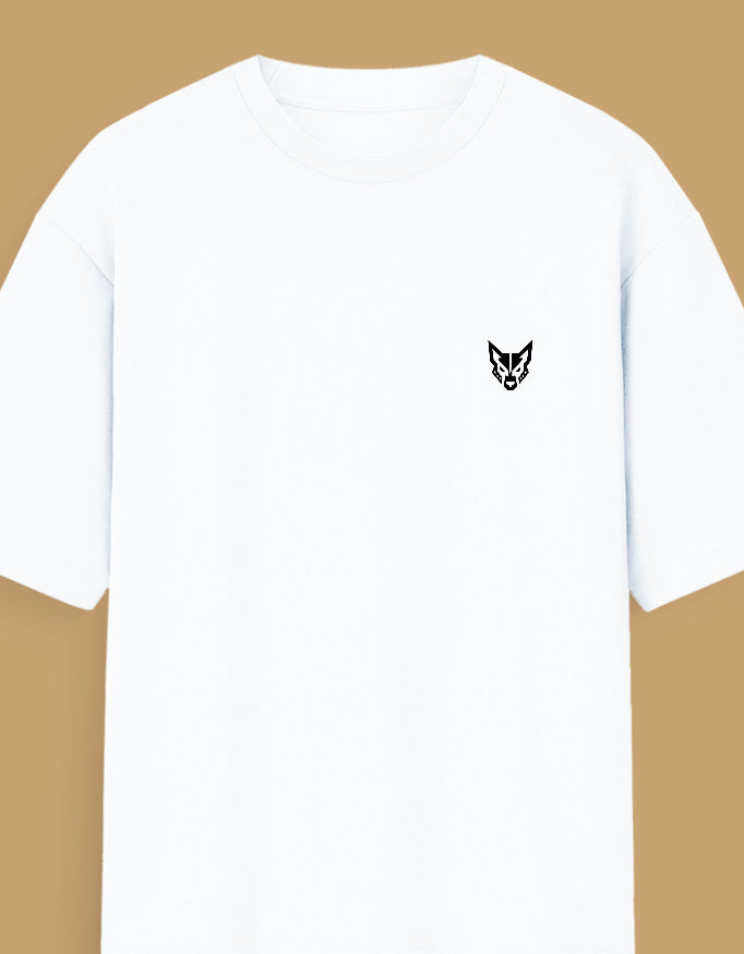 A white short-sleeve crewneck t-shirt with a small black geometric wolf head logo on the left chest, displayed against a solid tan background.