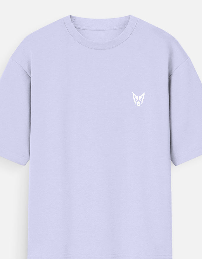 A light lavender crewneck t-shirt with a small white embroidered fox head logo on the left chest, shown against a plain off-white background.